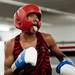 Cleveland boxer Francis Stewart sticks his tongue out during the third bout on Friday, July 19. Daniel Brenner I AnnArbor.com